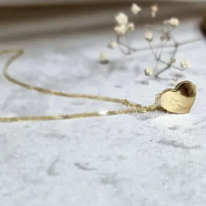 A gold dainty heart necklace