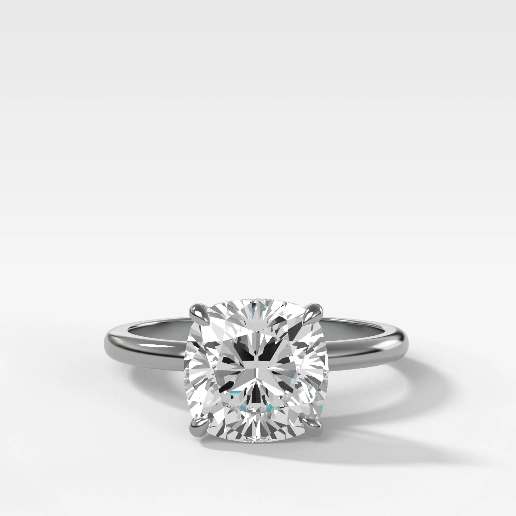 Crescent Solitaire Engagement Ring With Cushion Cut Diamond