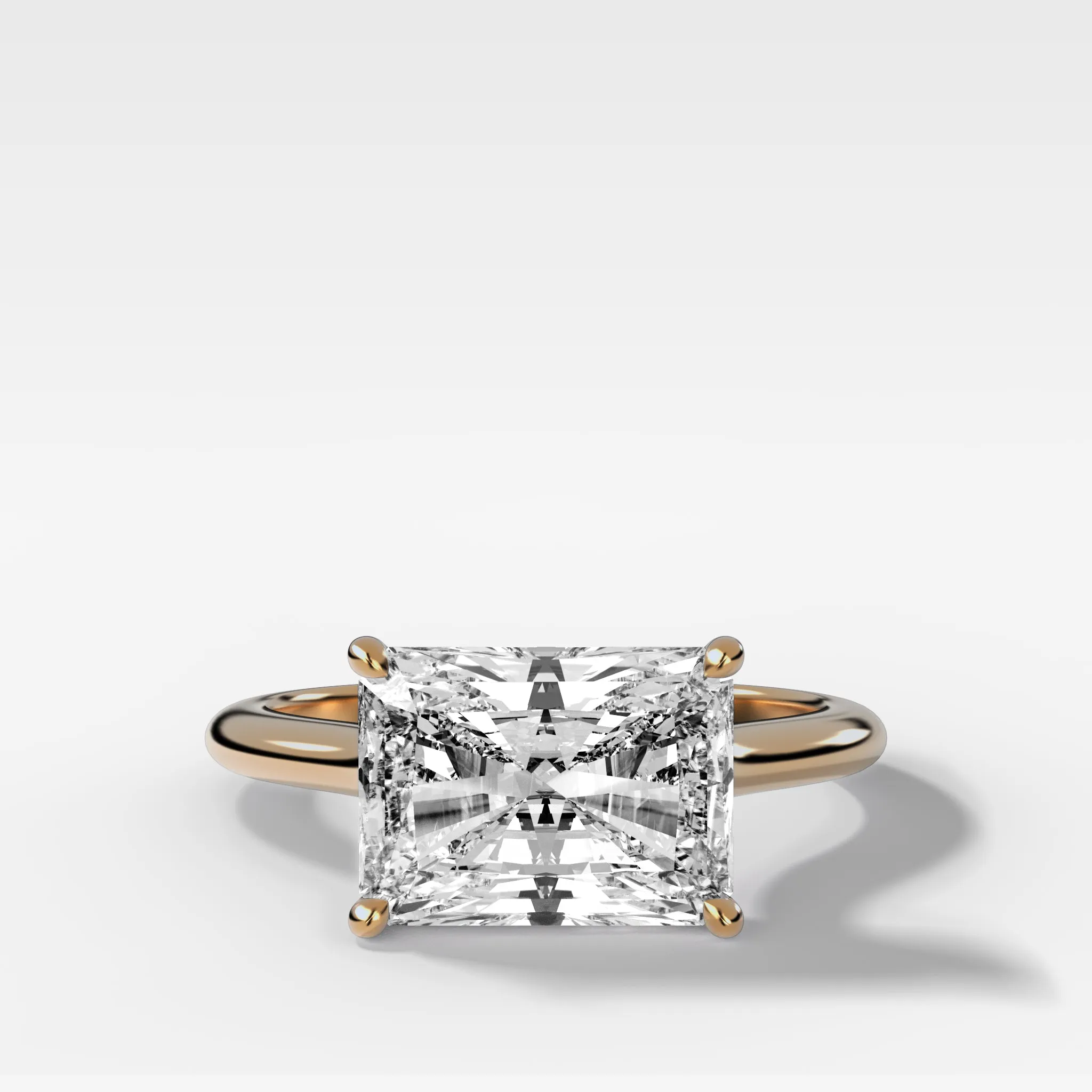 Crescent Solitaire Engagement Ring With Elongated Radiant Cut Diamond (East West)