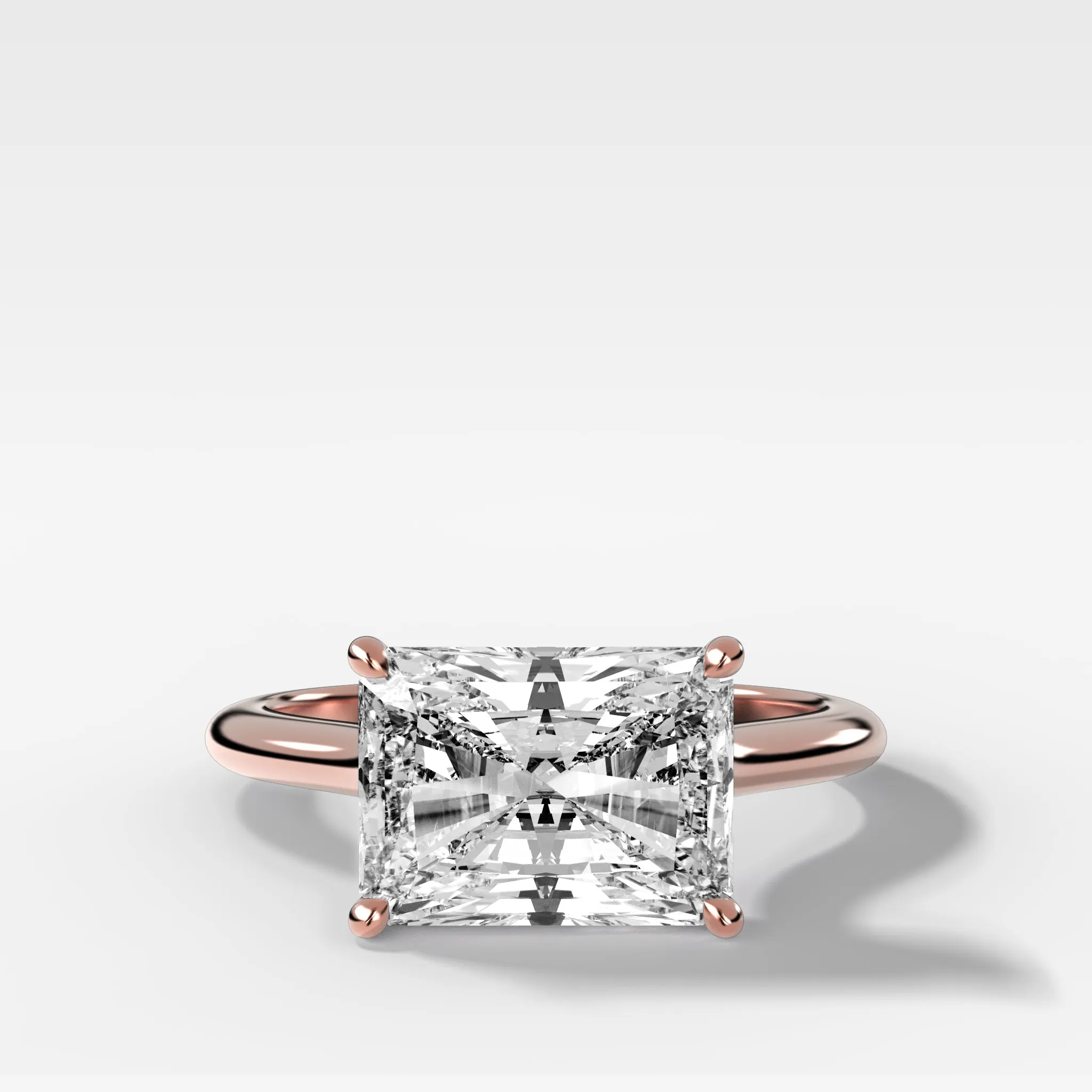 Crescent Solitaire Engagement Ring With Elongated Radiant Cut Diamond (East West)