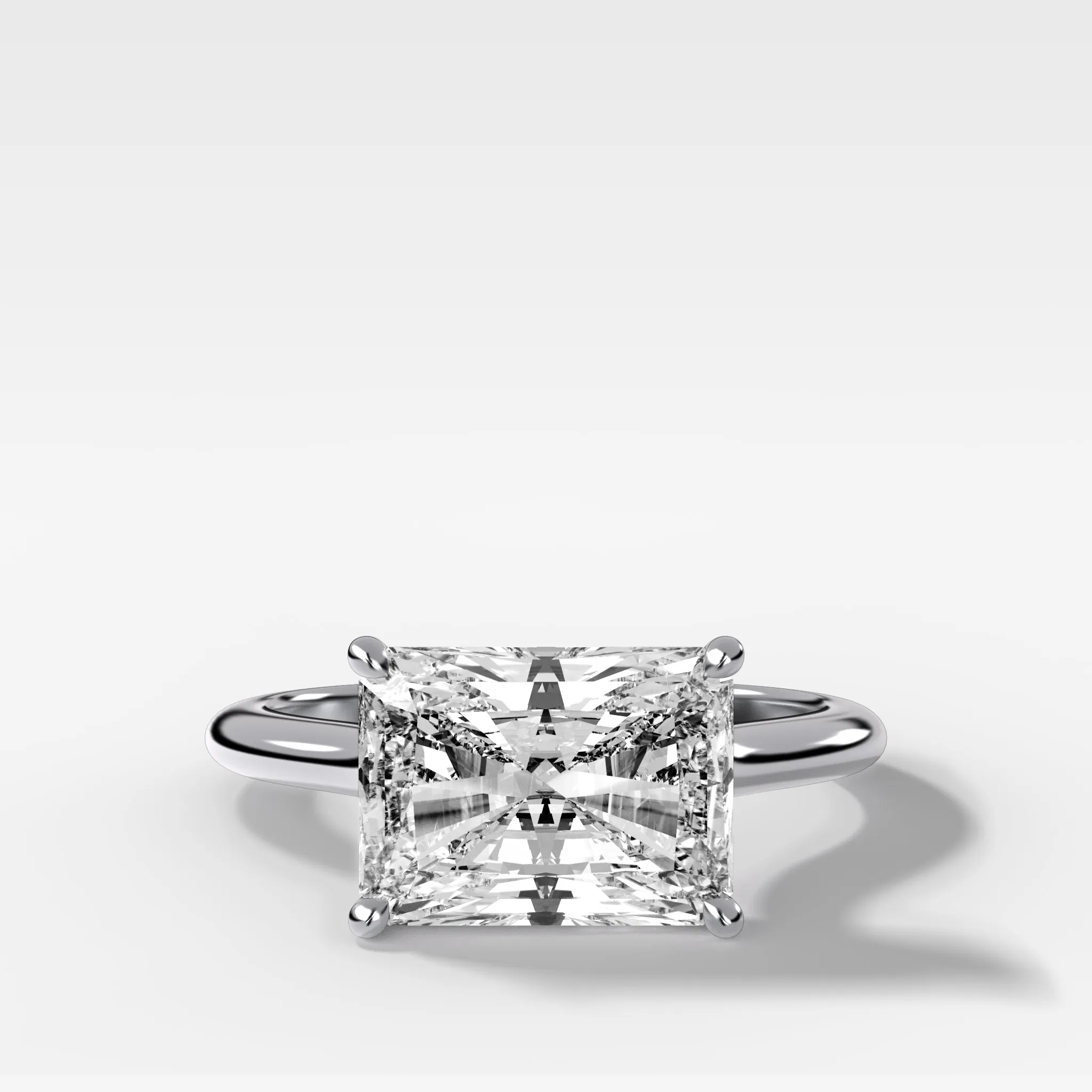 Crescent Solitaire Engagement Ring With Elongated Radiant Cut Diamond (East West)