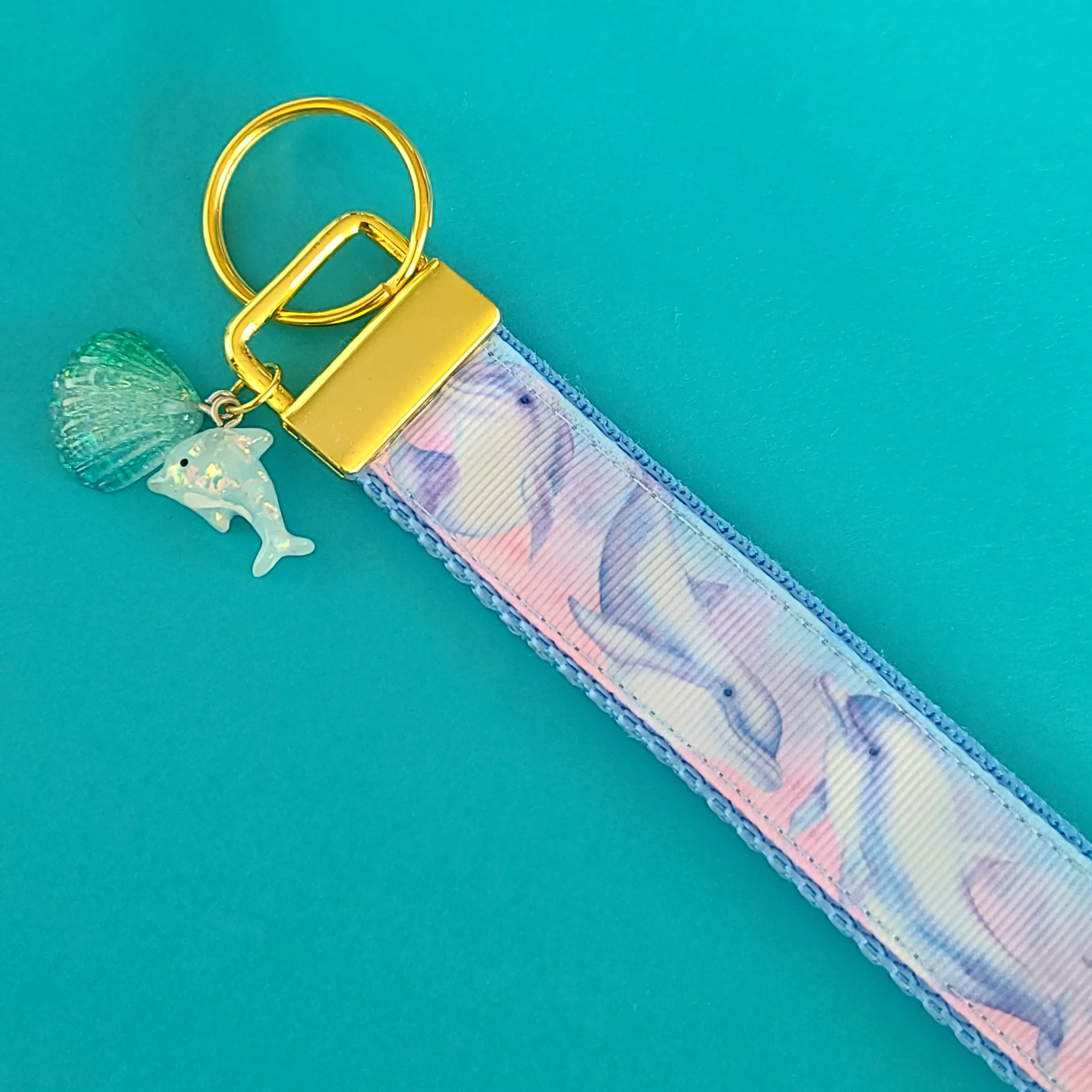Dolphins in Watercolor Pink Blue Waters on Yellow Gold Key Chain Fob  with Dolphin Charm