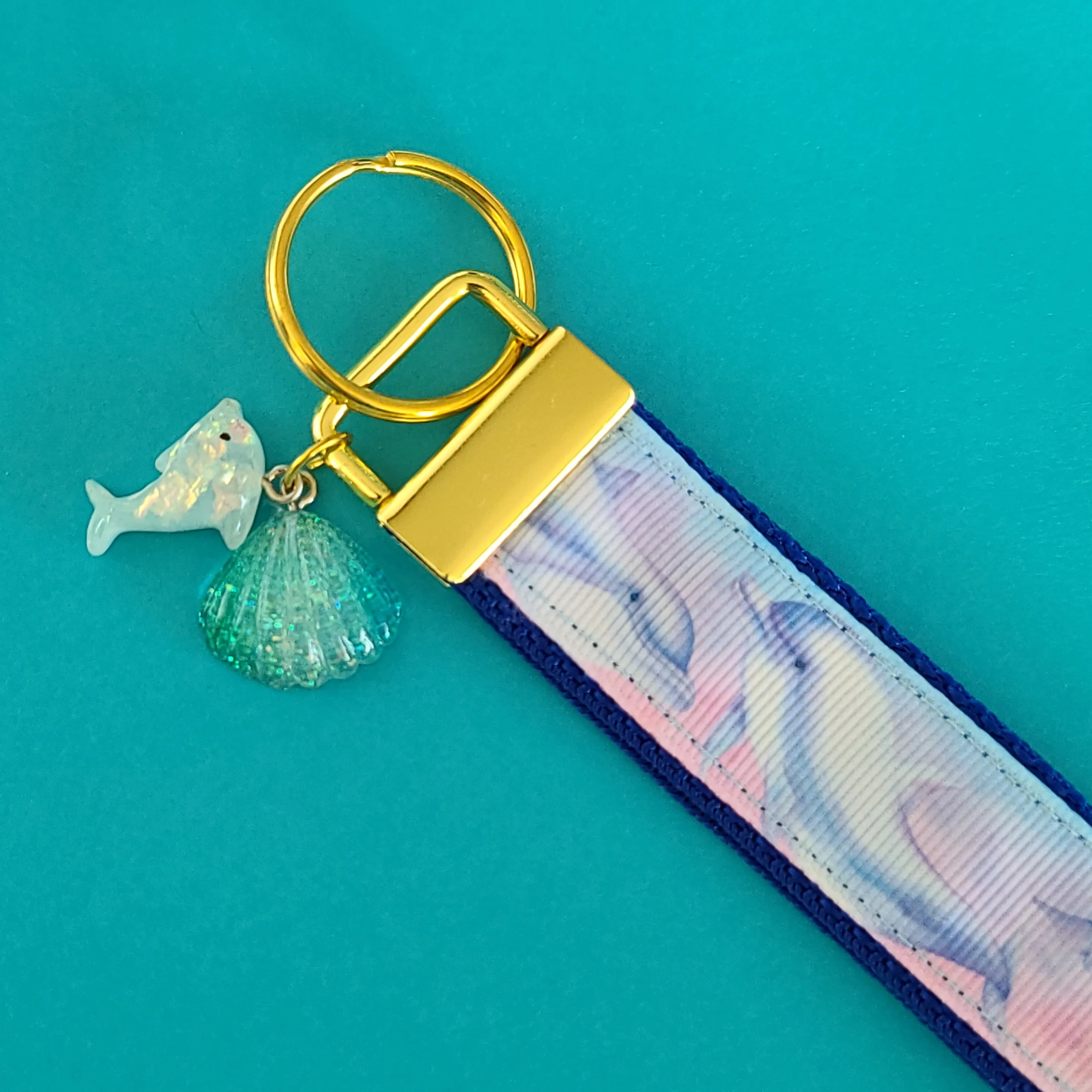 Dolphins in Watercolor Pink Blue Waters on Yellow Gold Key Chain Fob  with Dolphin Charm
