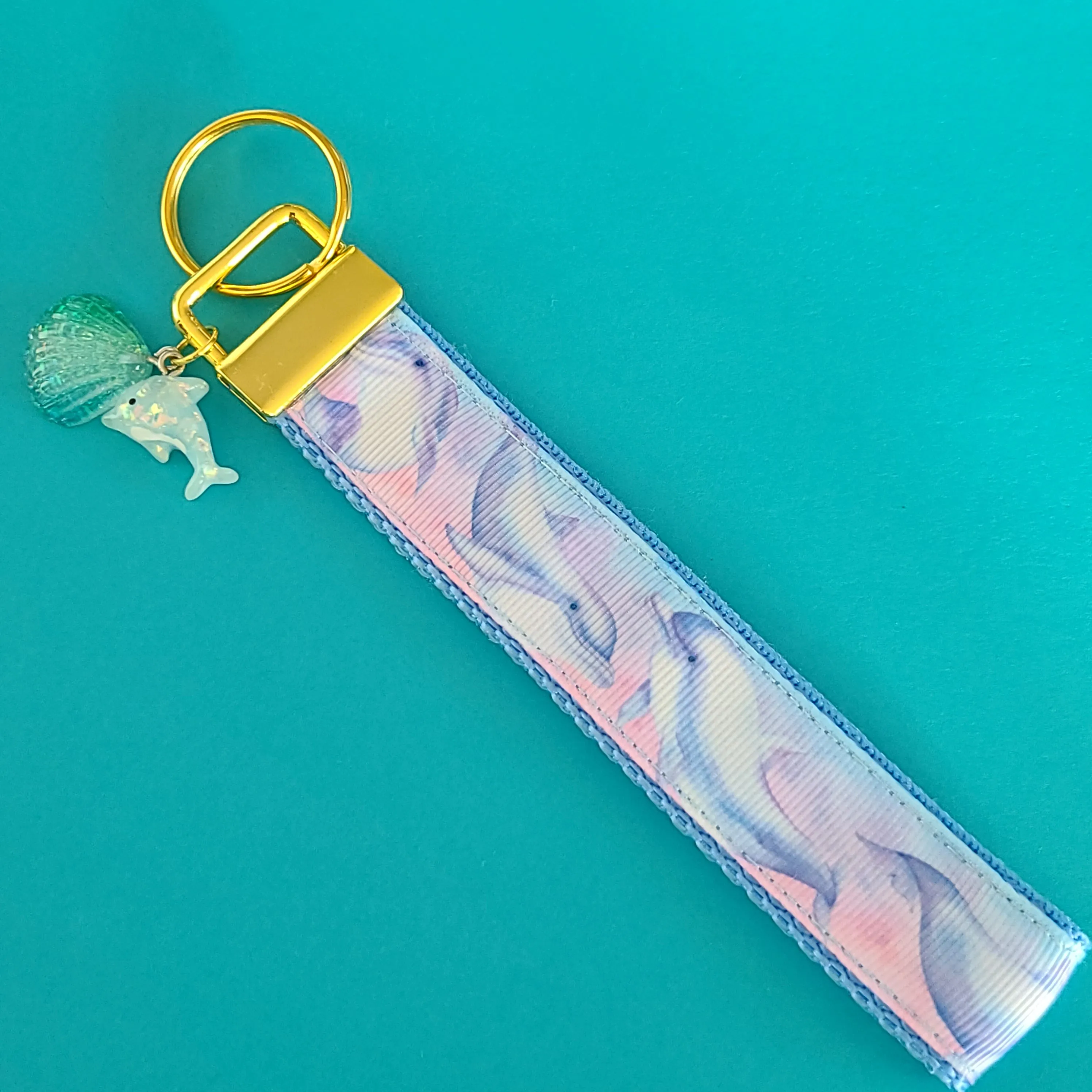 Dolphins in Watercolor Pink Blue Waters on Yellow Gold Key Chain Fob  with Dolphin Charm