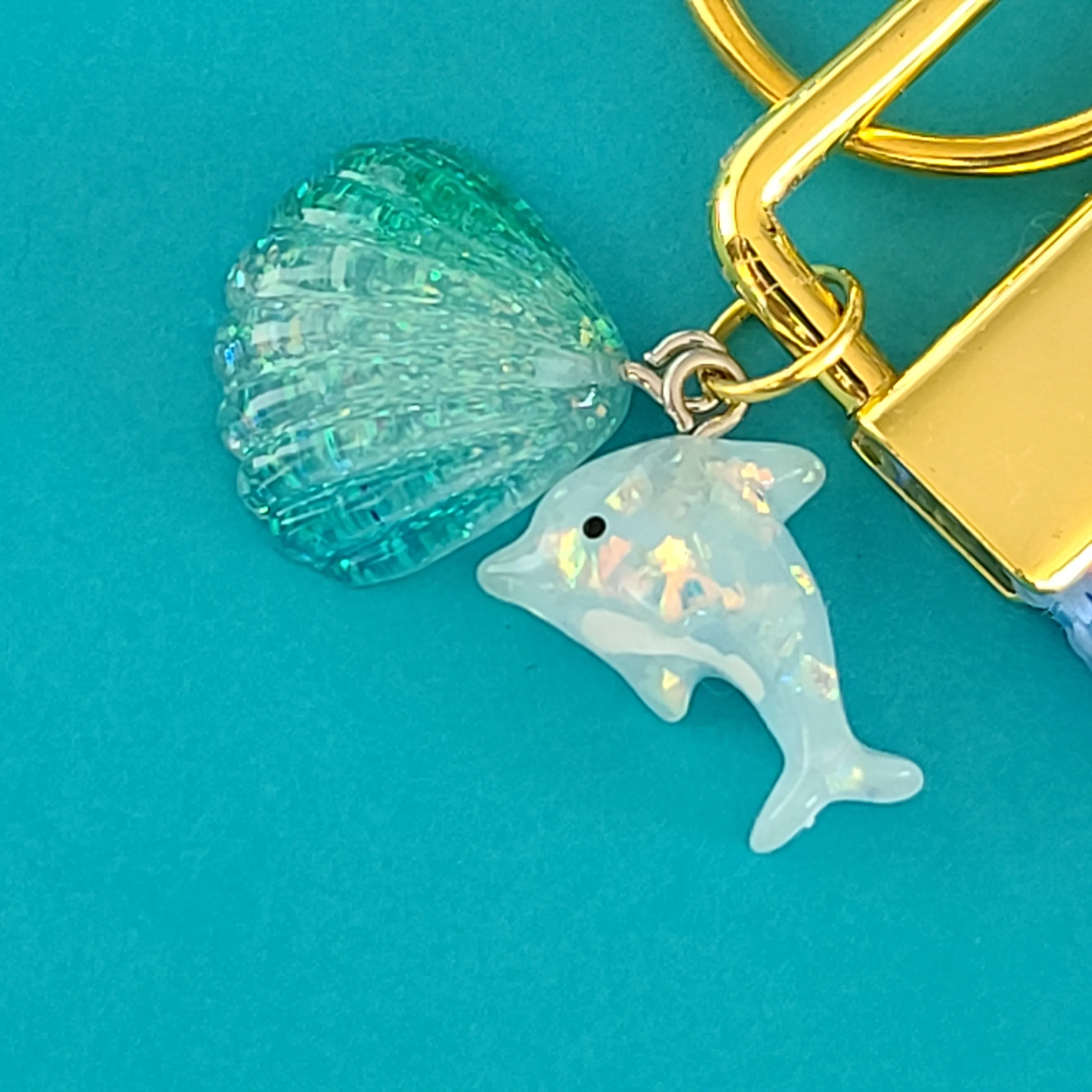 Dolphins in Watercolor Pink Blue Waters on Yellow Gold Key Chain Fob  with Dolphin Charm