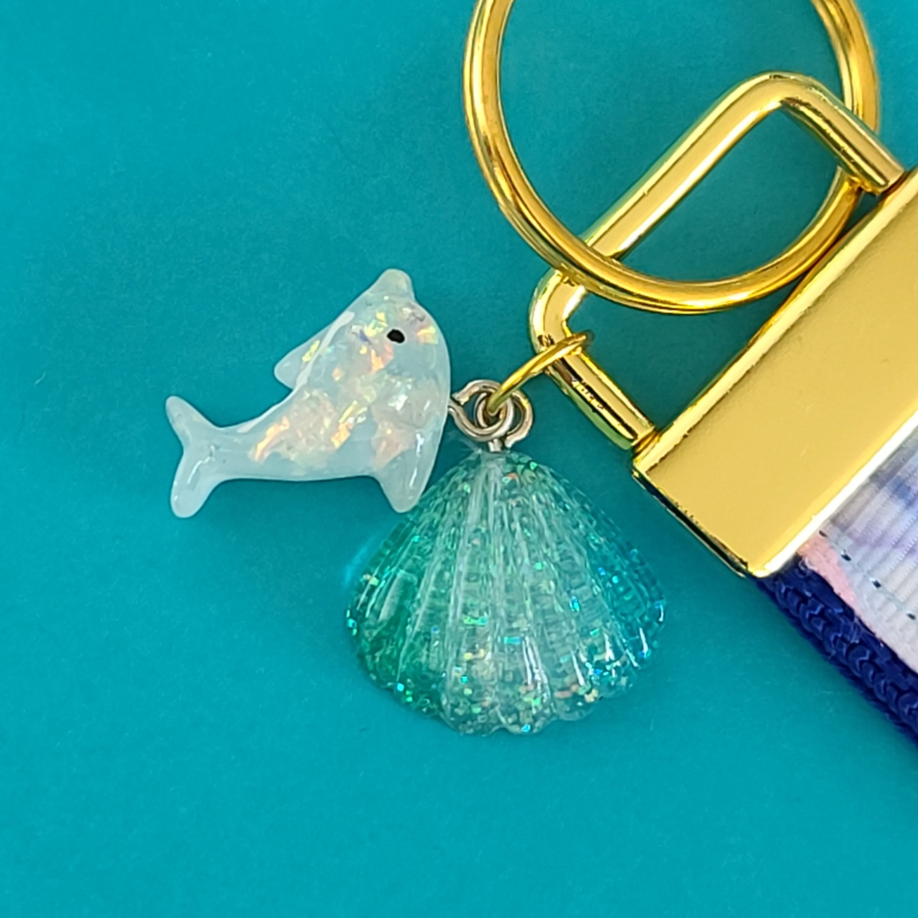 Dolphins in Watercolor Pink Blue Waters on Yellow Gold Key Chain Fob  with Dolphin Charm
