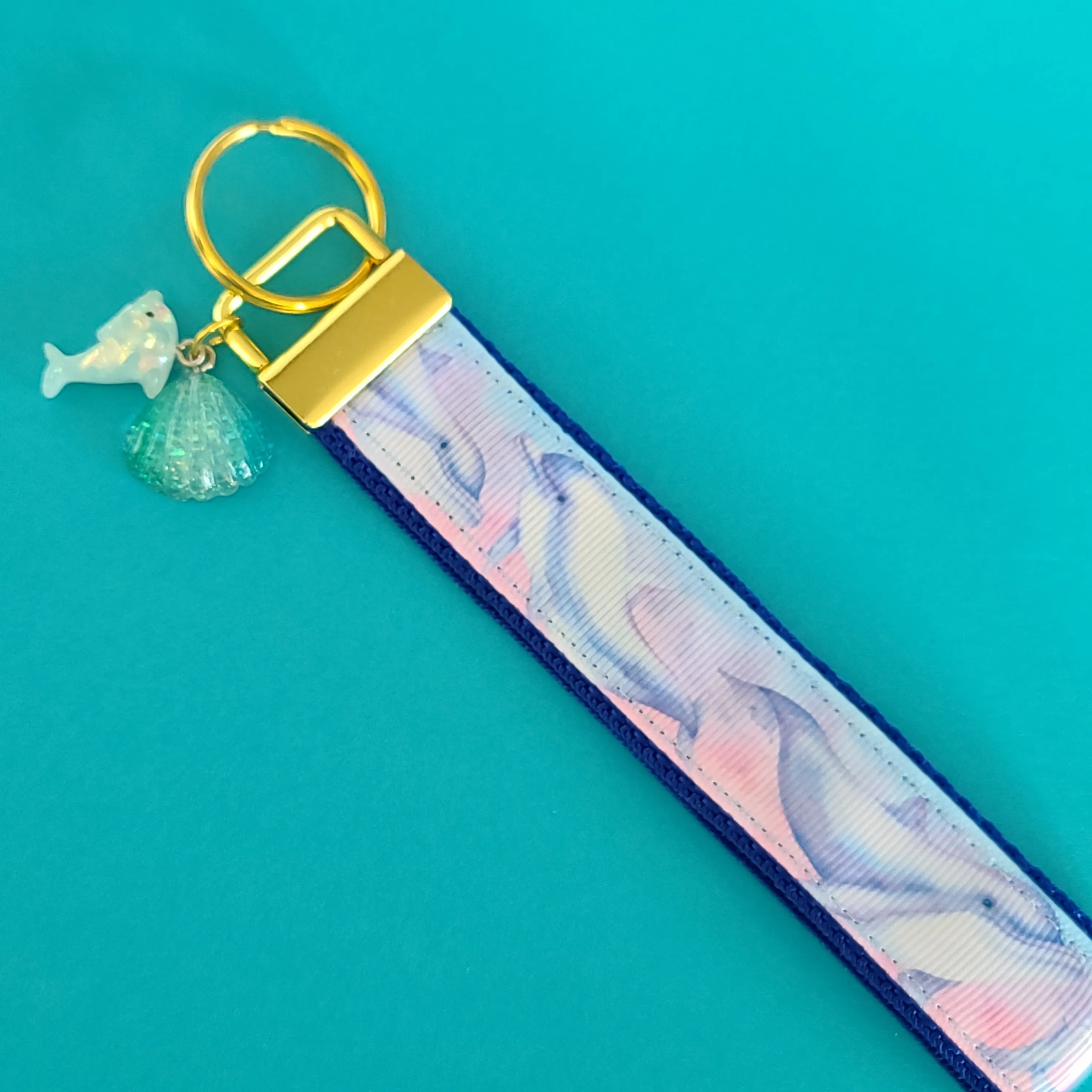 Dolphins in Watercolor Pink Blue Waters on Yellow Gold Key Chain Fob  with Dolphin Charm