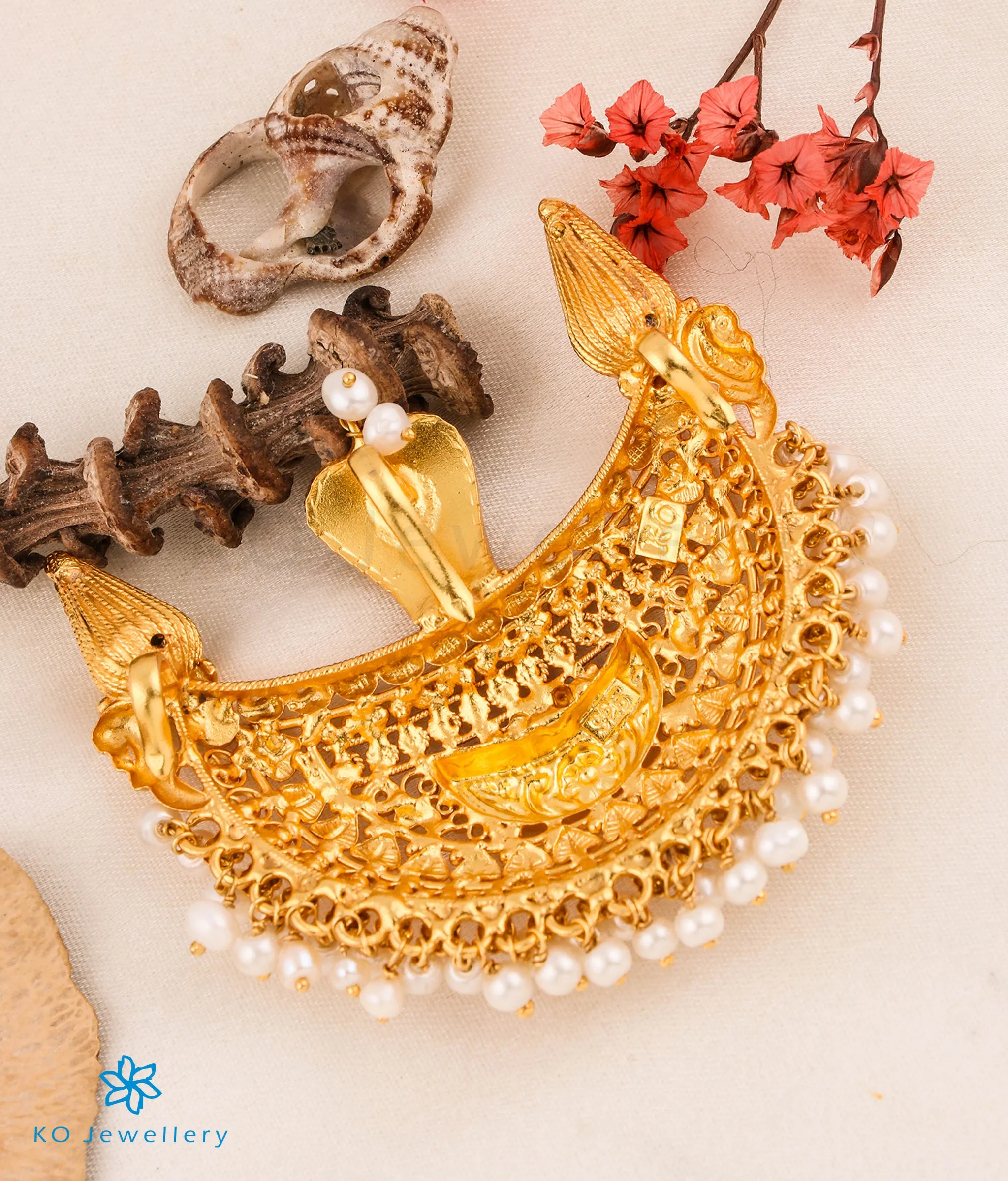 The Viloma Kokkethathi Silver Pendant