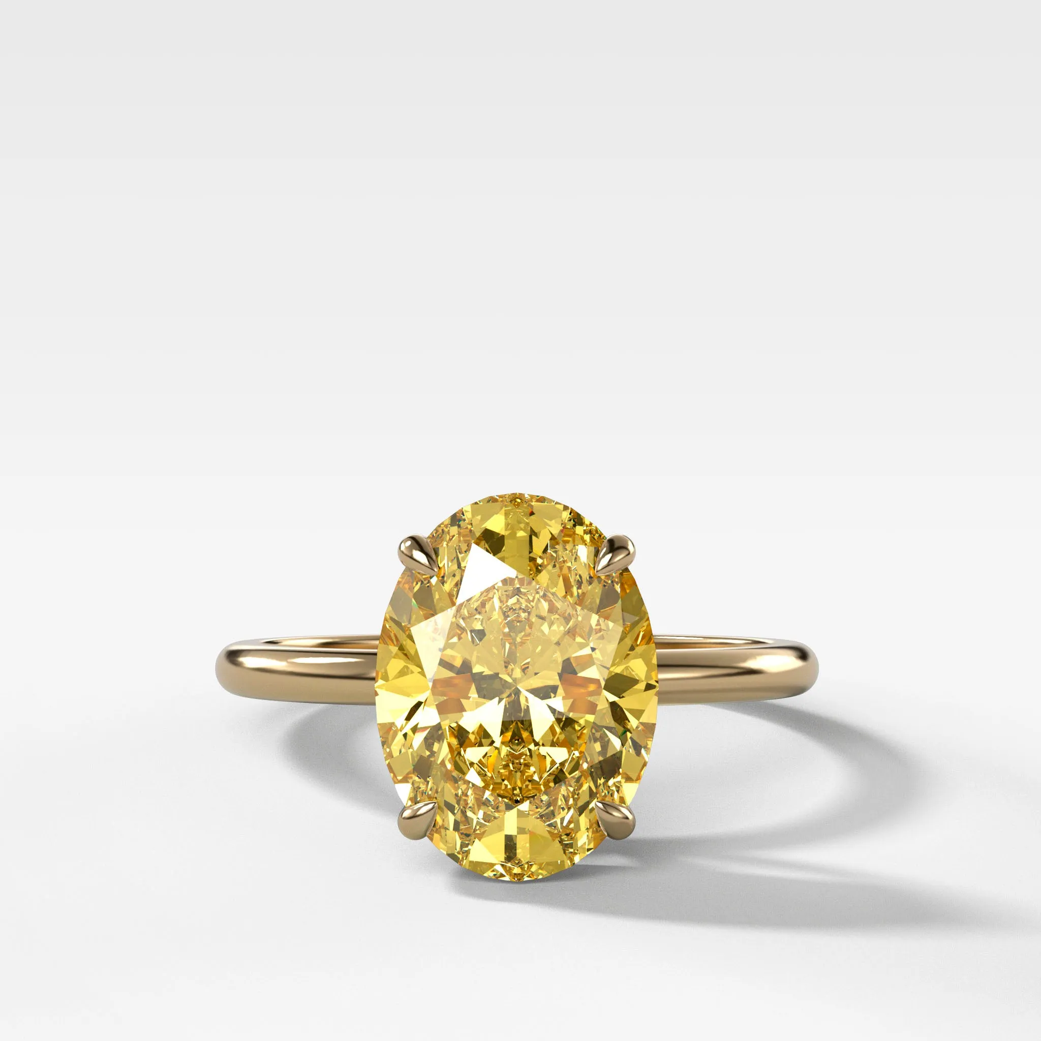 Thin   Simple Solitaire Engagement Ring With Canary Yellow Oval Cut Diamond