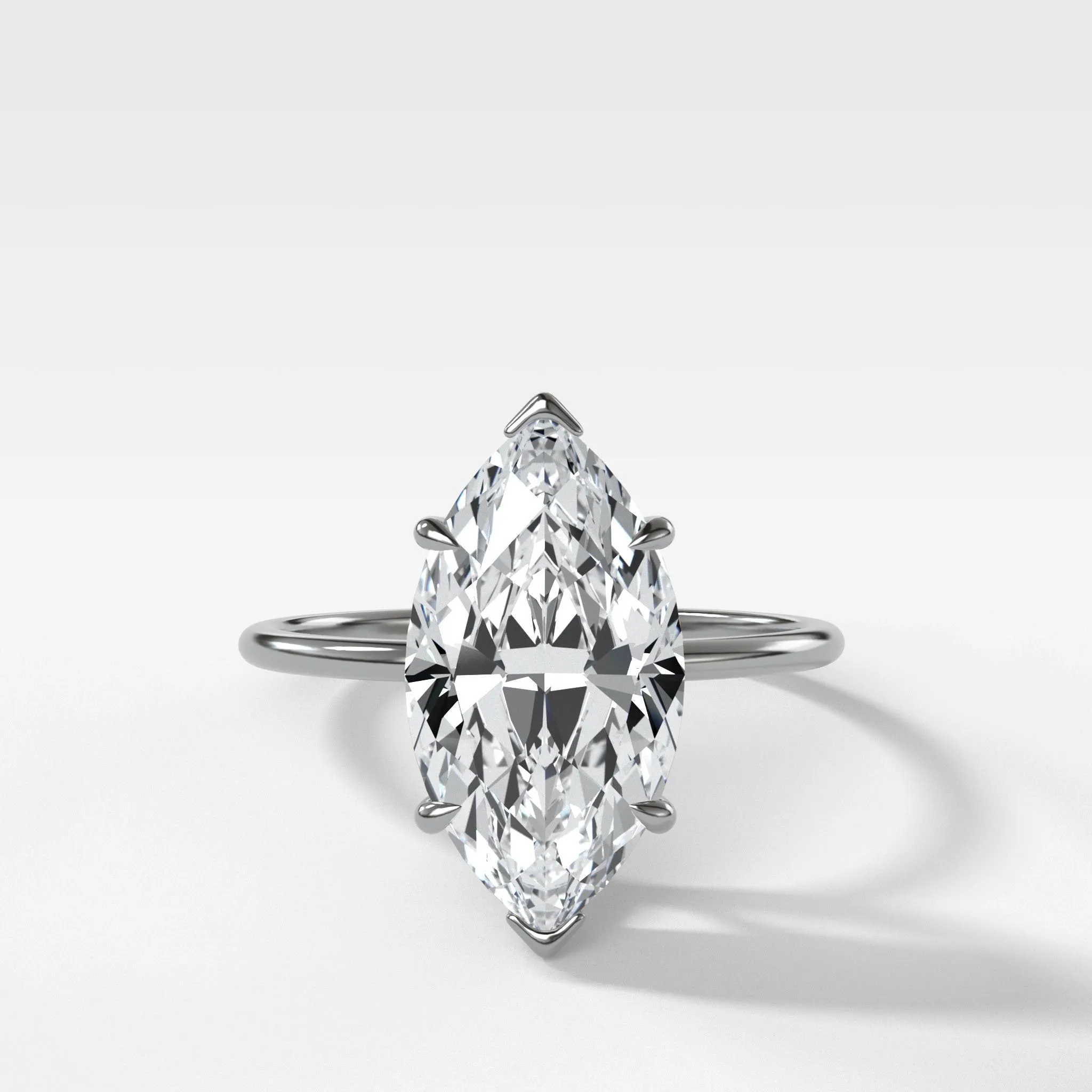 Thin   Simple Solitaire Engagement Ring With Marquise Cut Diamond