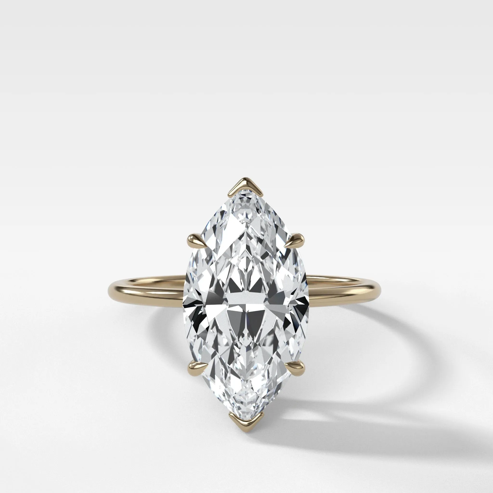 Thin   Simple Solitaire Engagement Ring With Marquise Cut Diamond