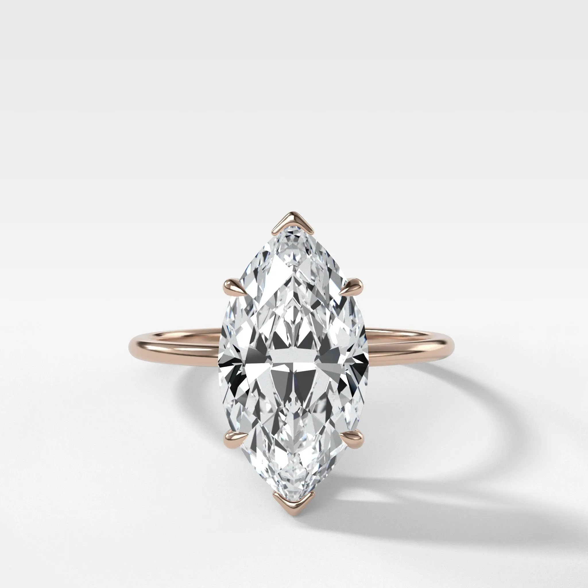 Thin   Simple Solitaire Engagement Ring With Marquise Cut Diamond