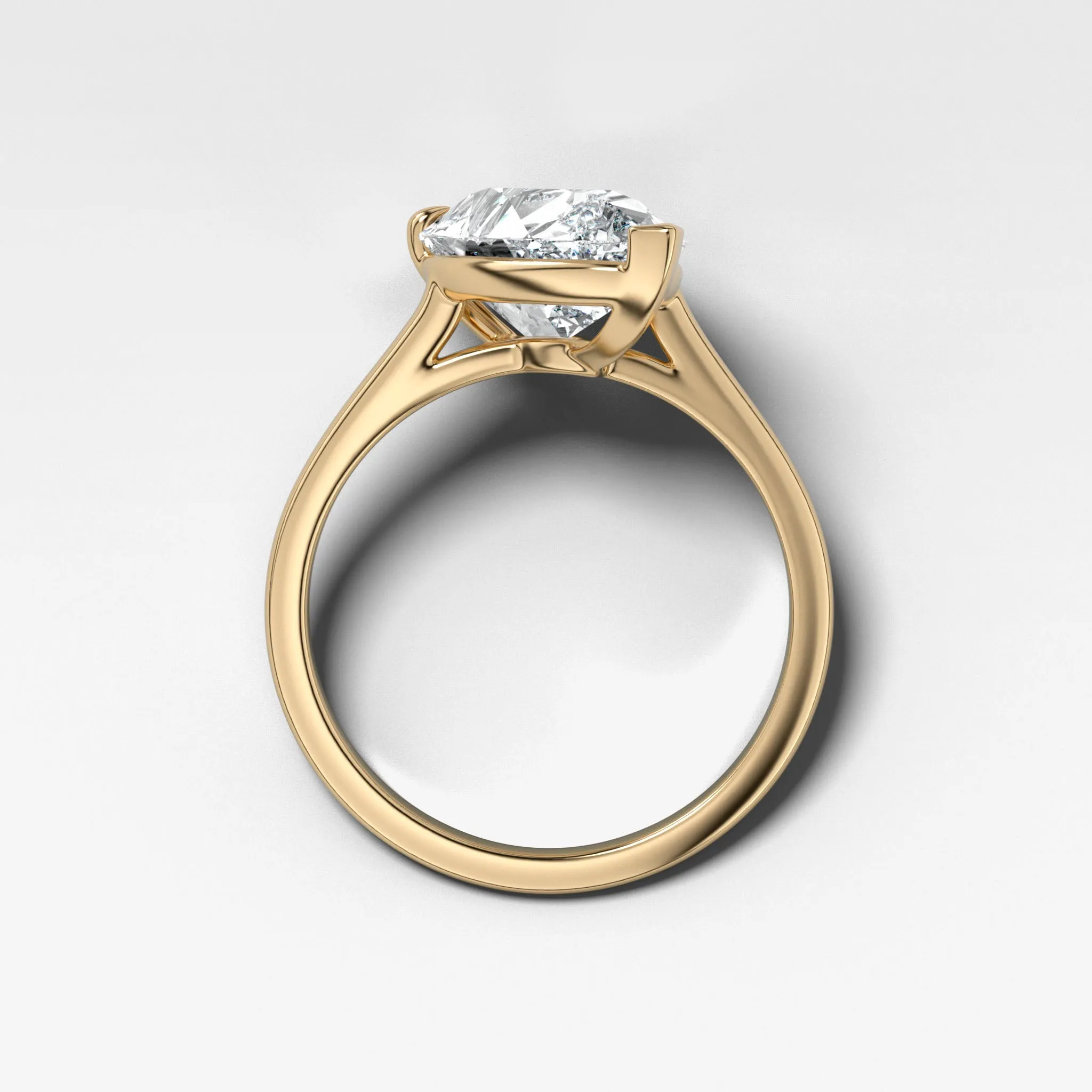 Tilted Thin   Simple Solitaire Engagement Ring With Pear Cut Diamond