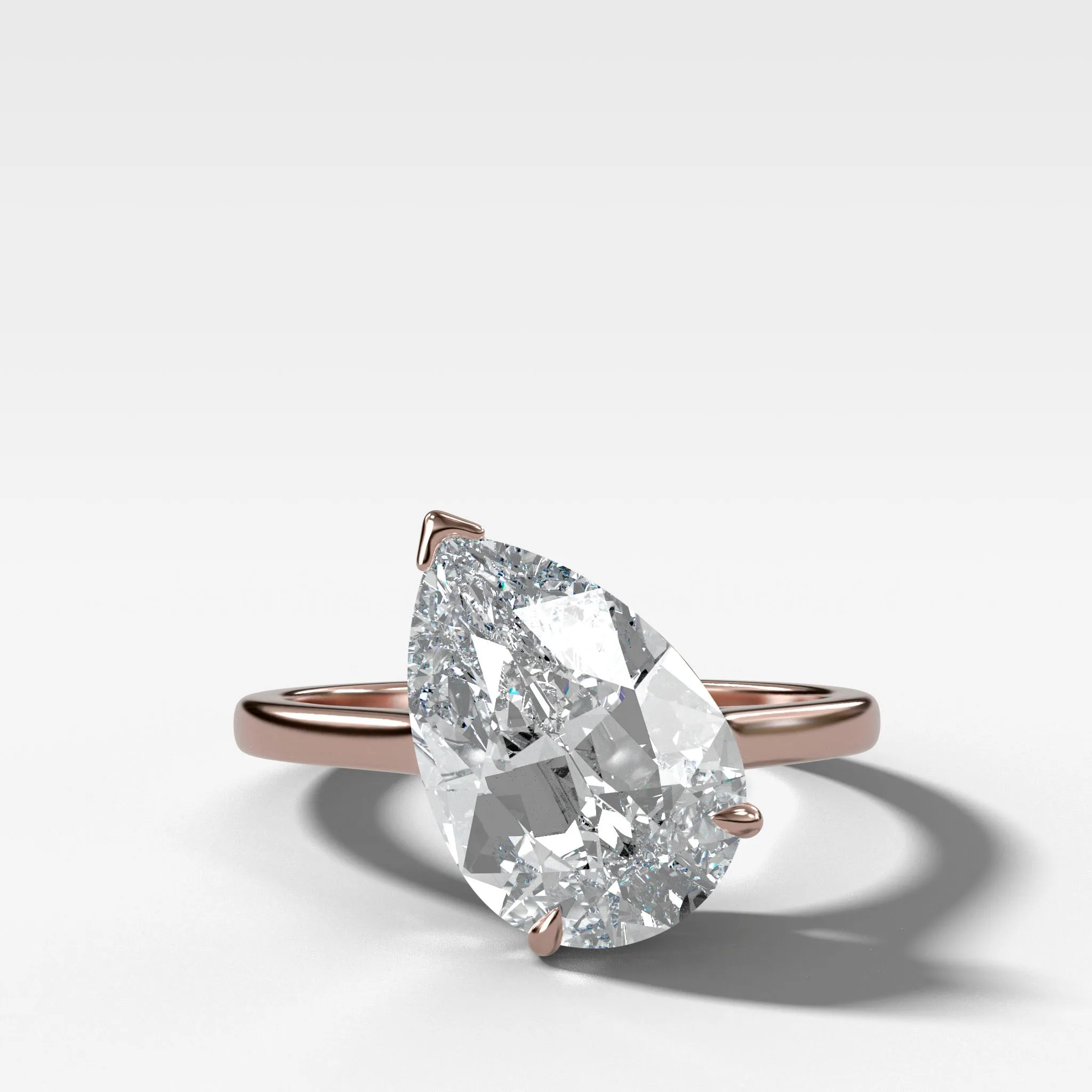 Tilted Thin   Simple Solitaire Engagement Ring With Pear Cut Diamond