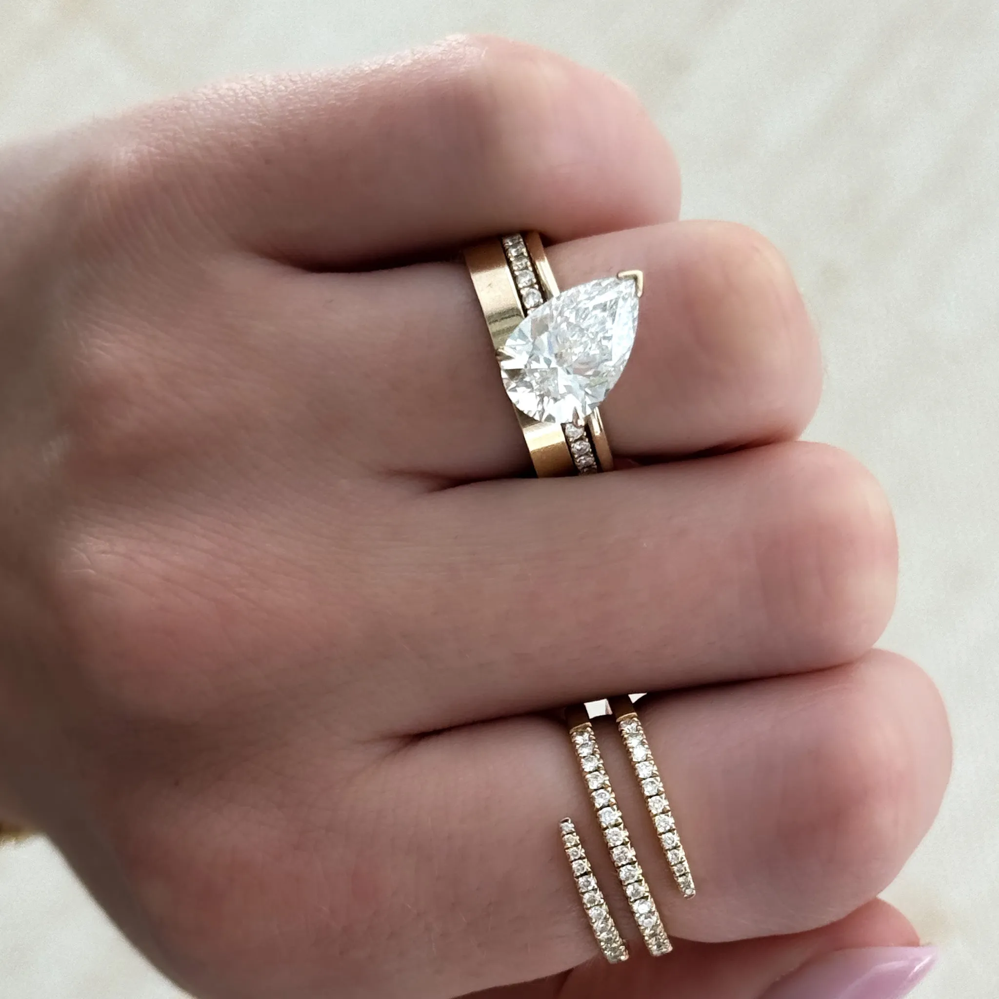 Tilted Thin   Simple Solitaire Engagement Ring With Pear Cut Diamond